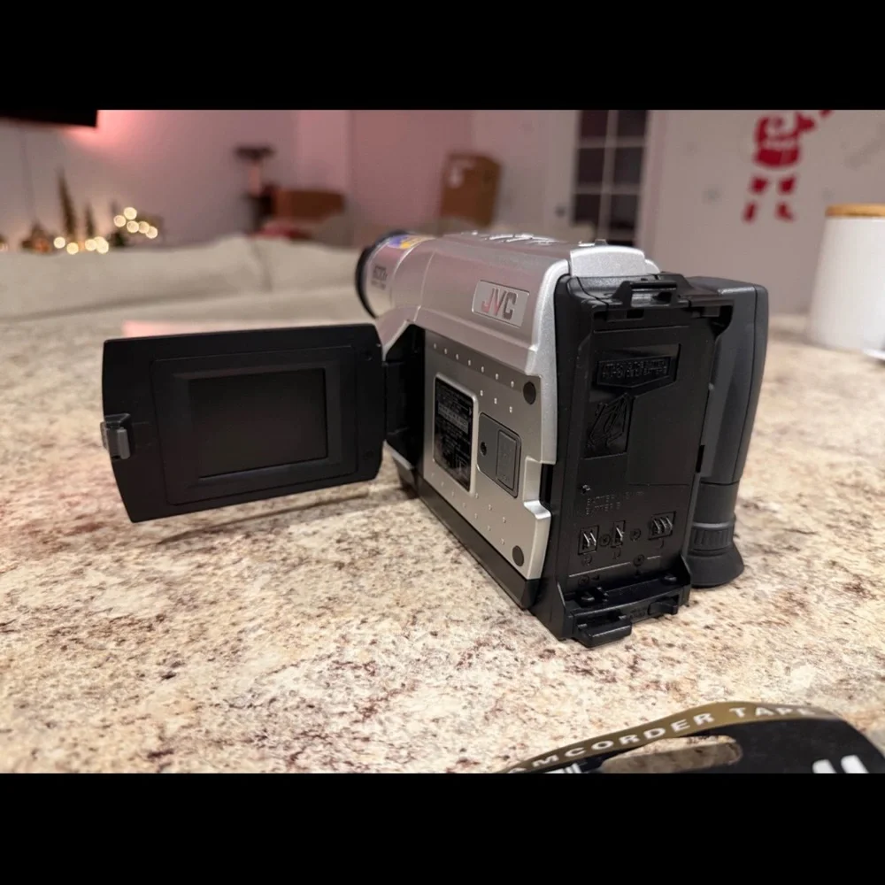 JVC Gray Camcorder with VHS-C Tapes